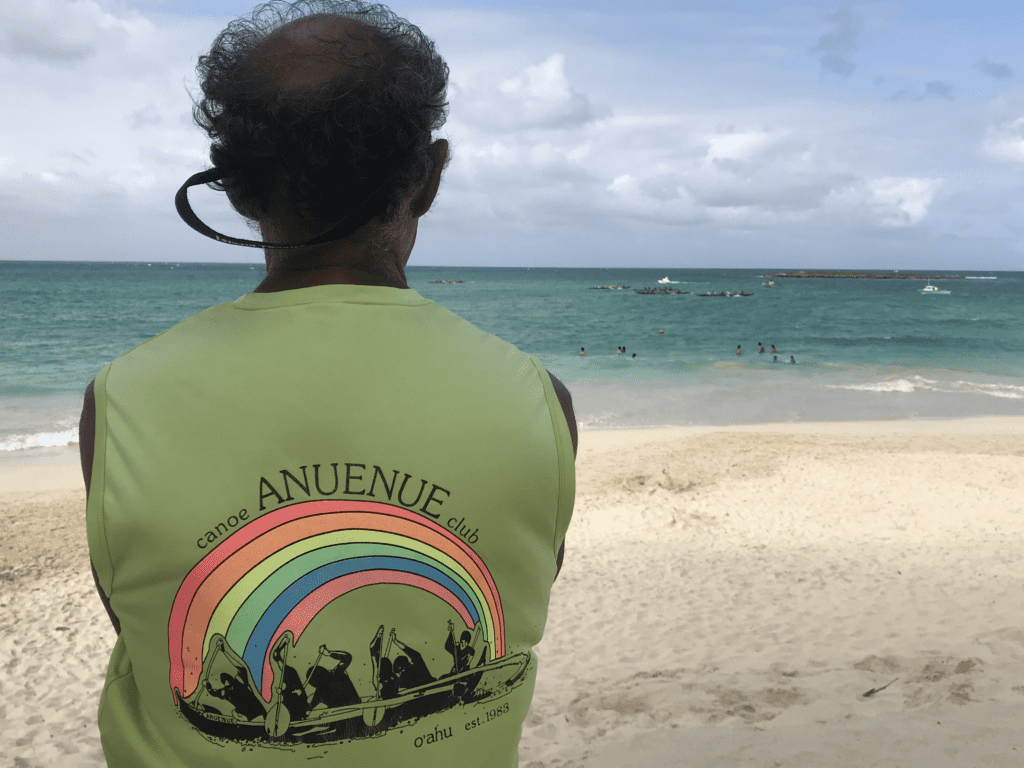 Famous Waterman Nappy Napoleon watching an Outrigger Canoe Race at Kailua Beach