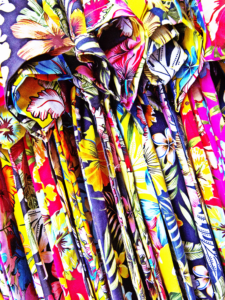 Hawaiian shirts available for purchase at the marketplace.