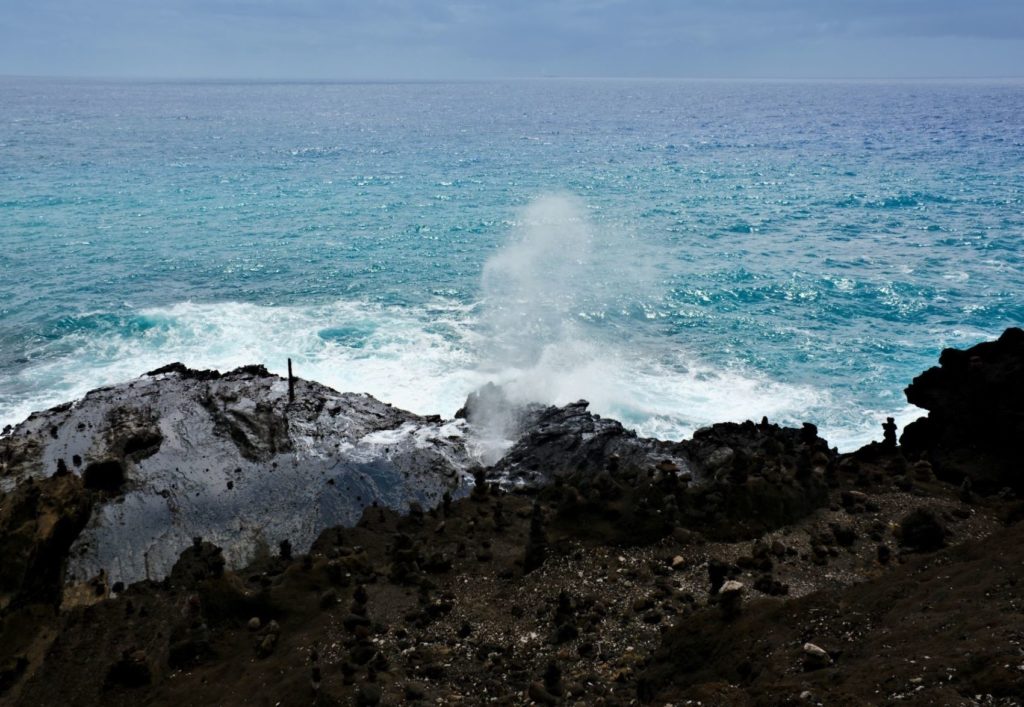Halona Blowhole shoots ocean water through a lava tube