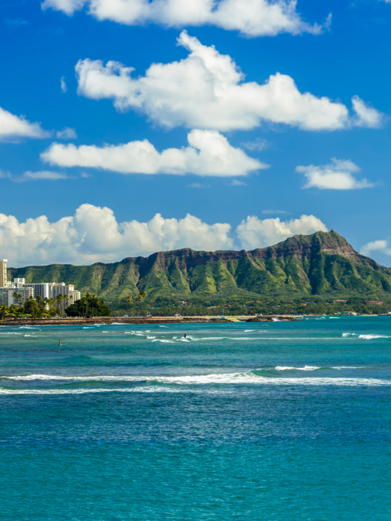 Diamond Head is visible from these beach hotels.