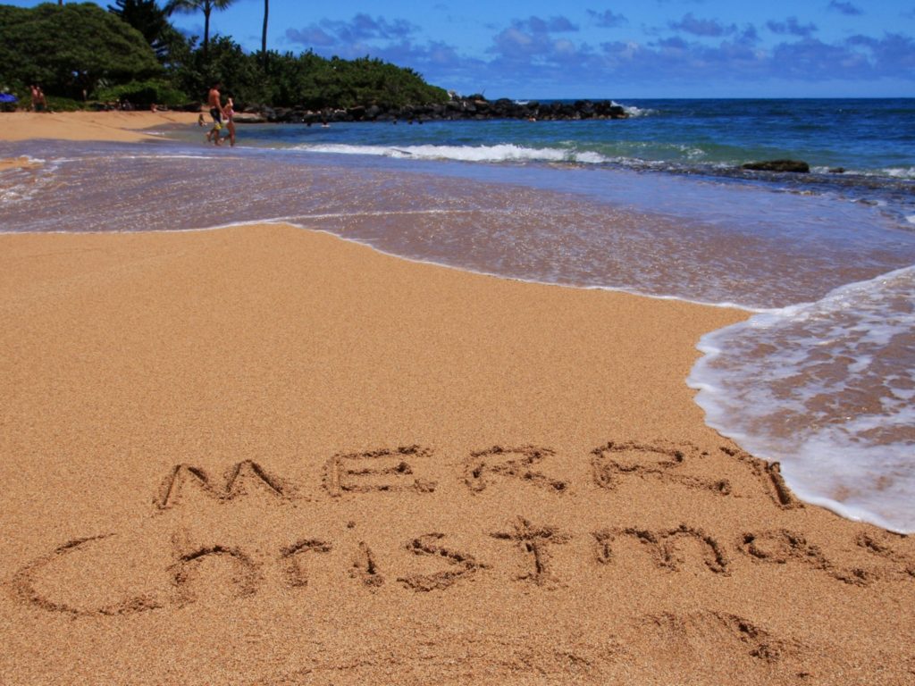 Merry Christmas written on a Kauai beach.