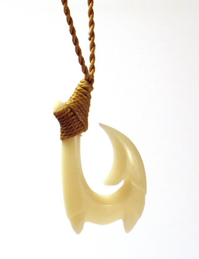 Fish hook symbols are worn around the neck to bring good luck