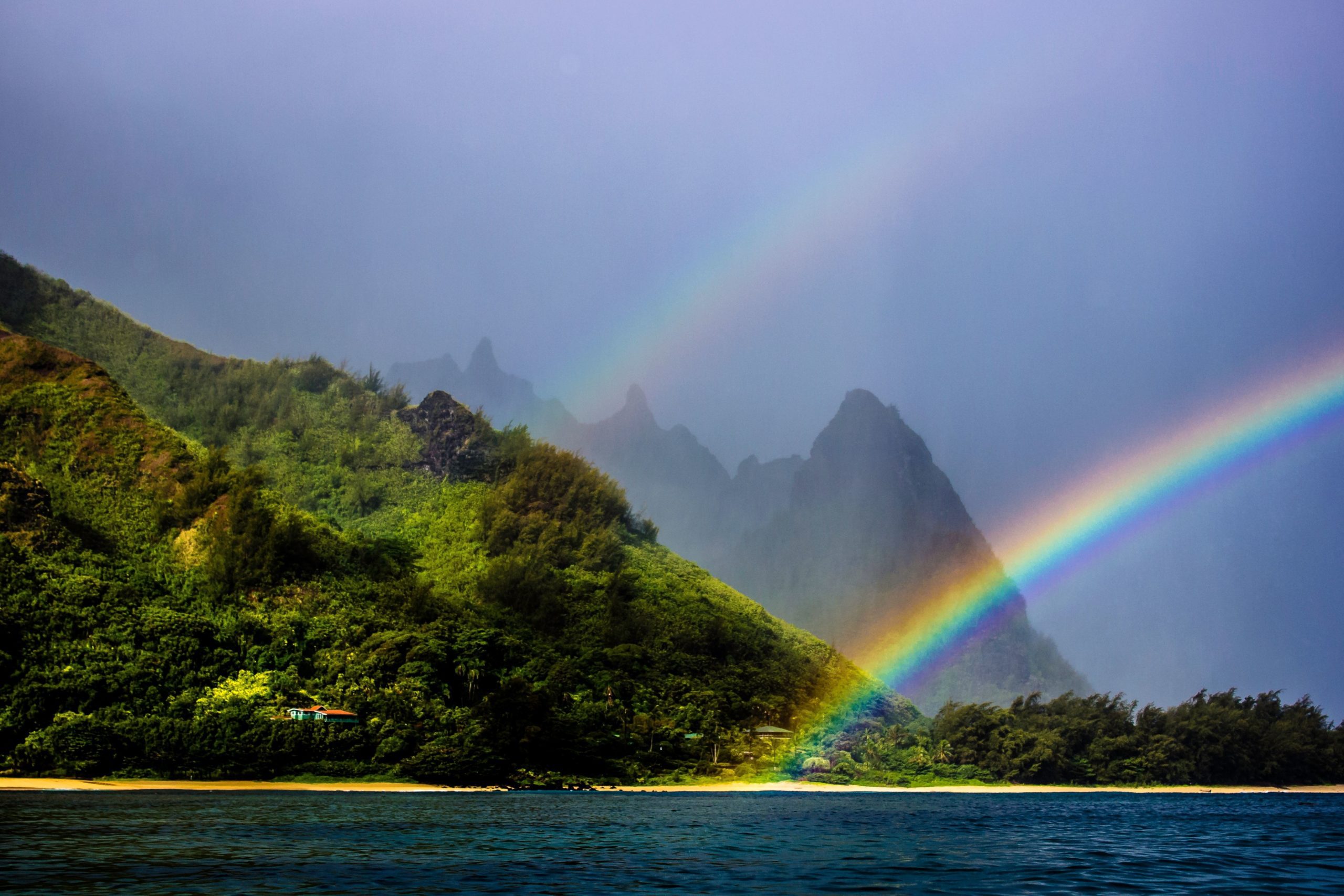 Rainfall in Kauai creates rainbows