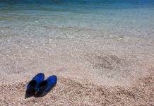 Swimming shoes are what to pack for a beach day in Hawaii