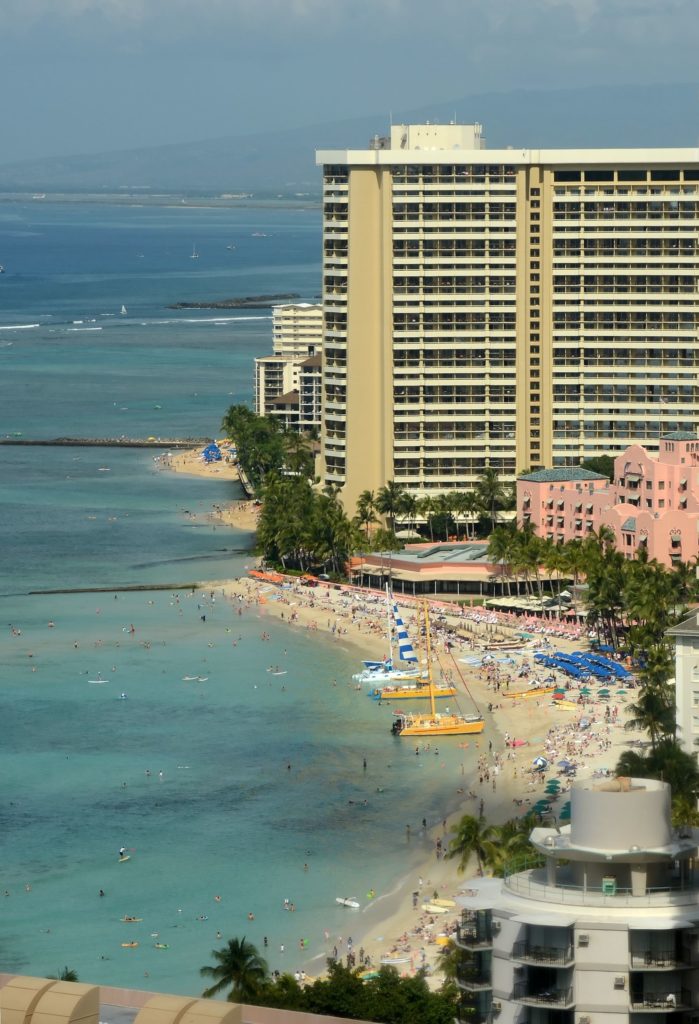 How bad is a vacation in Hawaii in 2021? You will see crowds on Waikiki Beach.