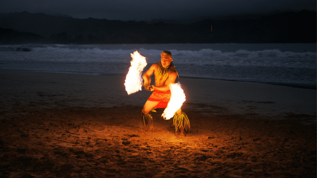 Traditional fire dancer during Luau.